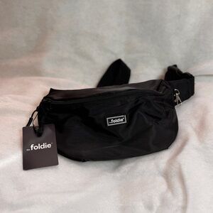 NWT The Foldie Black Crossbody Bag, Anti-Theft RFID-Safe Fanny Pack, Smart Zip